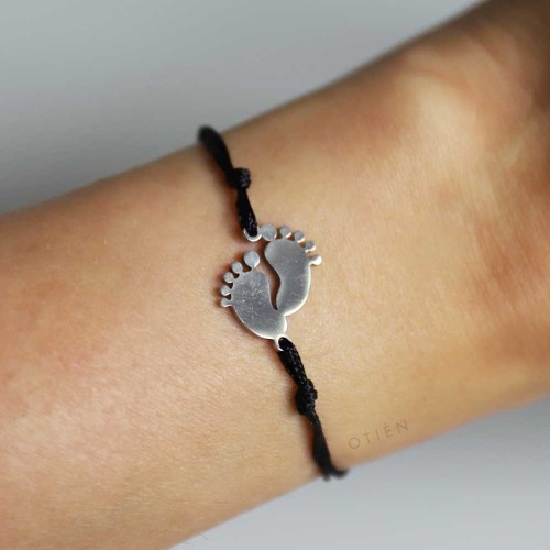 otien-bransoletka-srebrna-ze-stopkami-czarny sznurek-stal-jubilerska.jpg